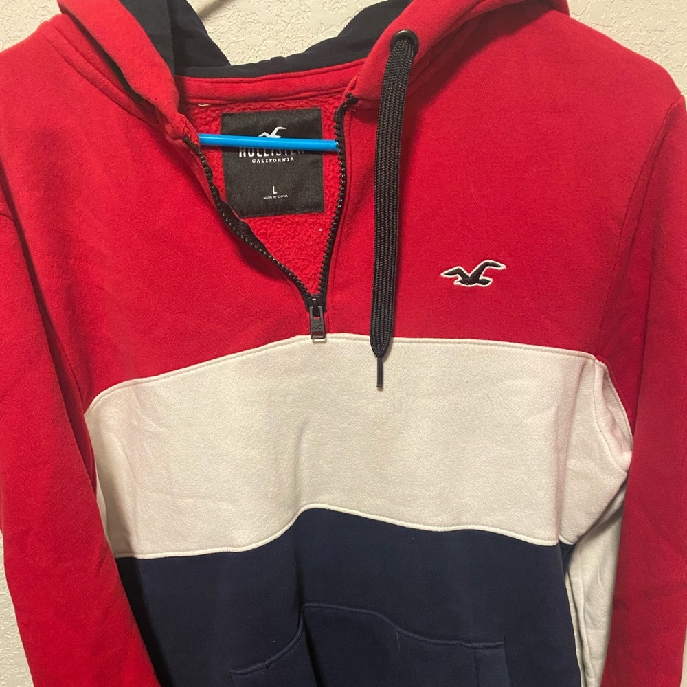 Red, white and blue hollister sweat shirt
